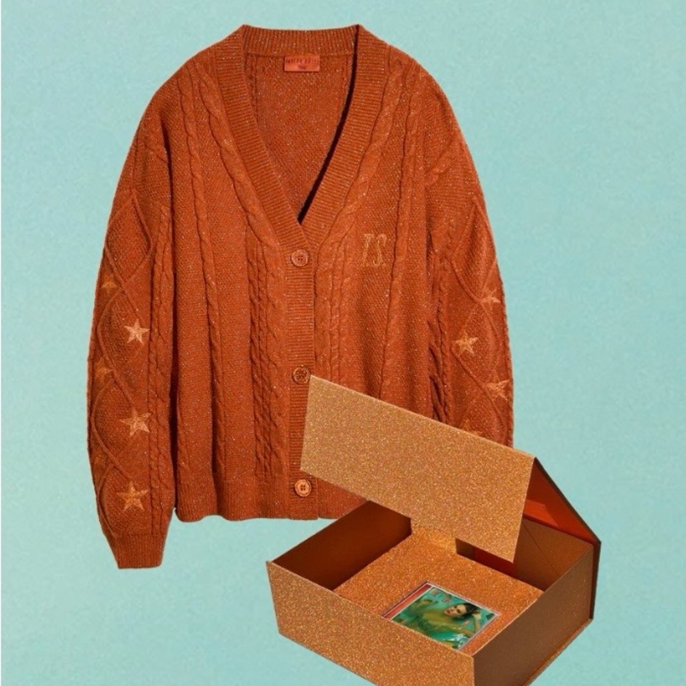 Taylor Swift Orange Cardigan. Size is medium large.